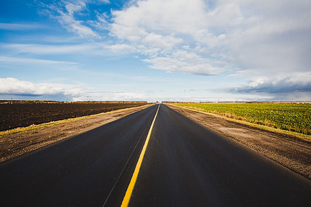 asphalt road during daytime thumbnail