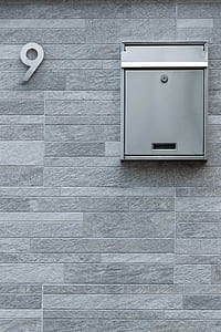 closed silver cabinet on wall thumbnail