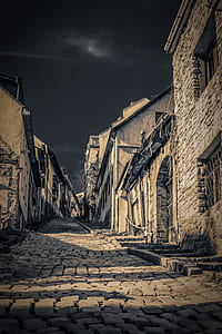 narrow building during night time thumbnail