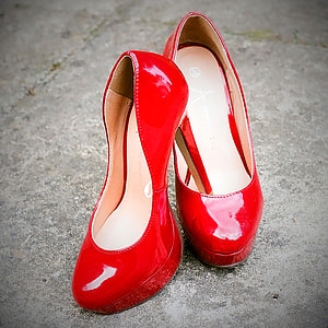 photo of pair of red patent leather platform heeled shoes thumbnail
