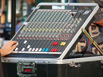 person using black audio mixer thumbnail