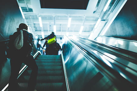 Person Riding on Escalator thumbnail