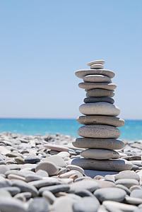 pile of stones beside sea thumbnail