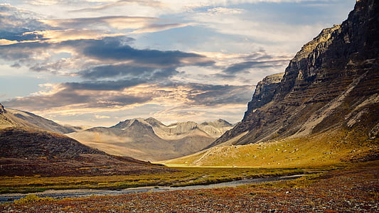 landscape photography of brown mountain during daytime thumbnail
