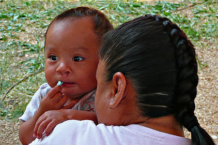 woman holding baby thumbnail