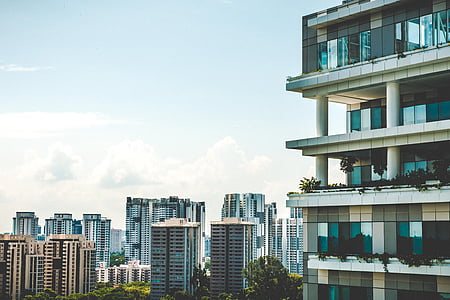 white concrete high rise building thumbnail