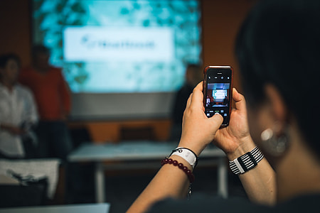 People taking photos with smartphones thumbnail