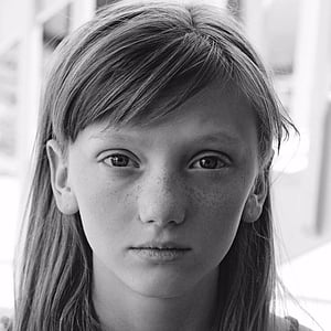 grayscale photography of girl's face thumbnail