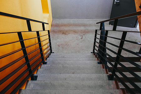 Staircase by a yellow wall thumbnail