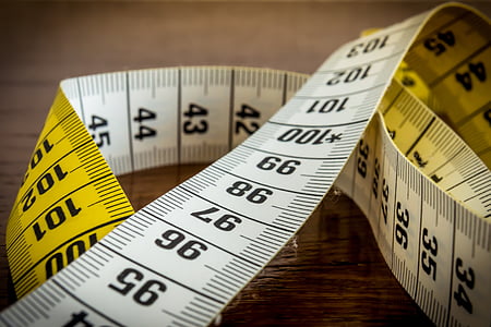 closeup photo of yellow and white measuring tape thumbnail