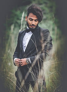 Photography of a Man Wearing Black Suit thumbnail