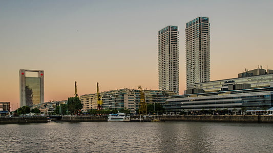 white cruise ship on body of water during golden hour thumbnail