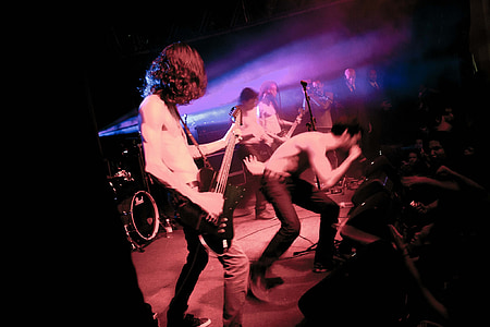 bands performing on stage thumbnail
