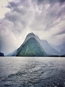 island with cloud formation photo thumbnail