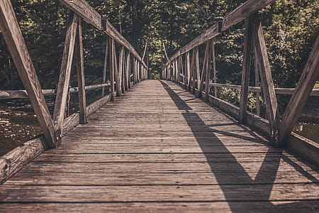 Alley Photography of Brown Wooden Bridge thumbnail