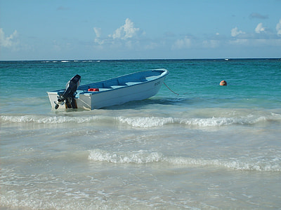boat anchored on shore thumbnail