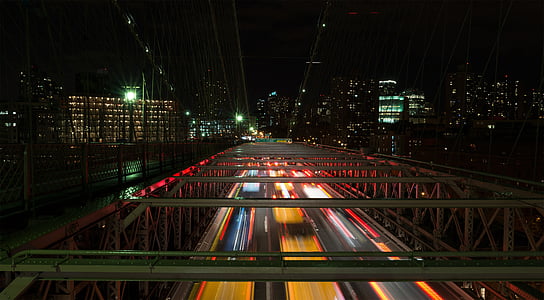 timelpse photo of gray metal bridge thumbnail