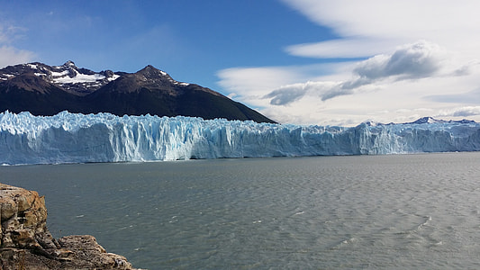 brown and gray mountain near body of water thumbnail