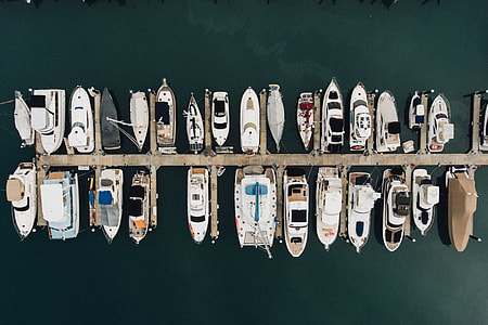 aerial view photography of boats on body of water thumbnail