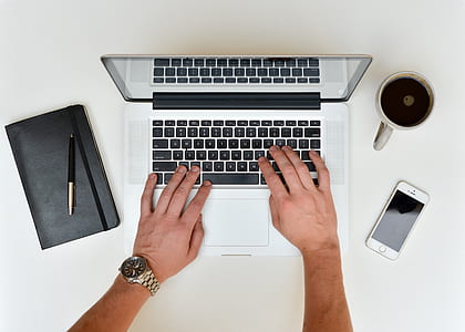 person using MacBook Pro thumbnail