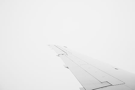 left plane wing during daytime thumbnail