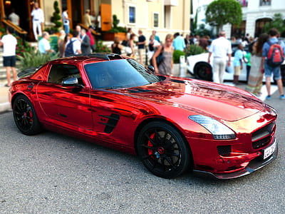 red sports car on road thumbnail