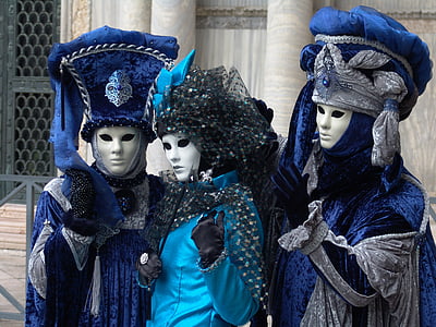 three person wearing blue traditional suits at daytime thumbnail