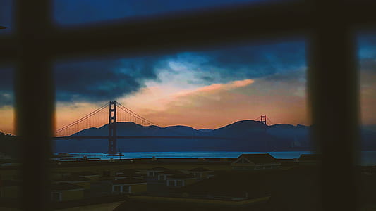 person taking photo of Golden Bridge thumbnail