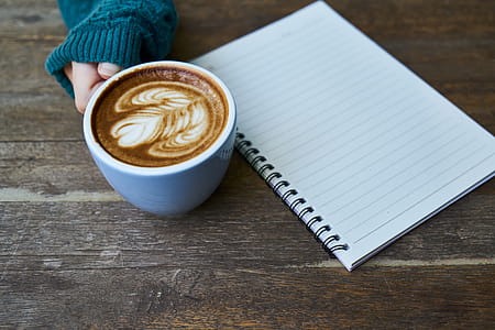 Blue Teacup Beside White Ruled Paper thumbnail
