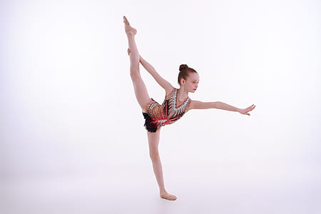woman wearing red and white glitter ballerina suit thumbnail