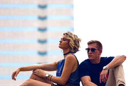 woman sitting beside man thumbnail