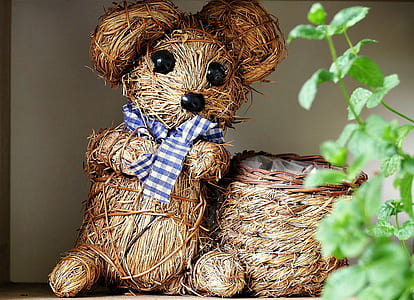 bear decor near plant thumbnail