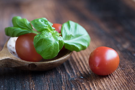 red tomatoes on ladle thumbnail