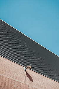light fixture outside brown building thumbnail