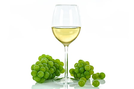 clear wine glass with brown liquid inside thumbnail