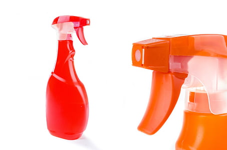 two red and orange plastic sprayers thumbnail