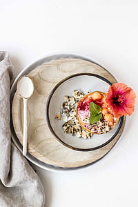 three round beige and white bowls with spoon thumbnail