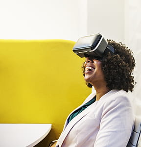 Smiling Woman Using Virtual Reality Headset thumbnail