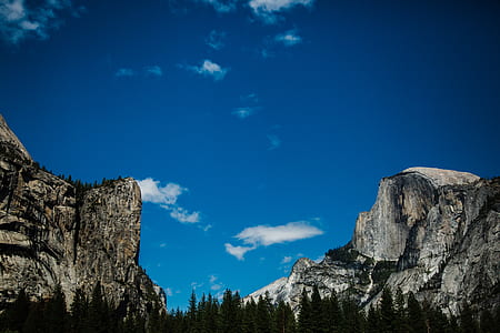 rock formation under blue sky at daytime thumbnail