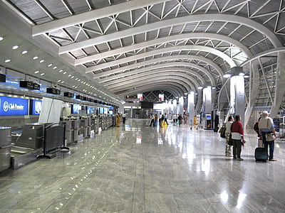 group of people walking inside airport thumbnail