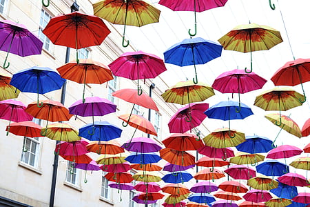 worms eye view photography of assorted-color umbrella ornaments thumbnail