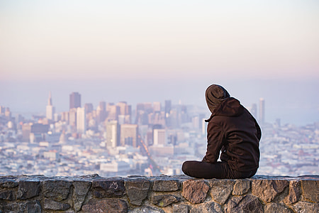 Young Man Enjoying Moment and Looking Over the San Francisco thumbnail
