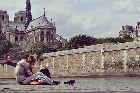 man and woman near wall of brown castle thumbnail