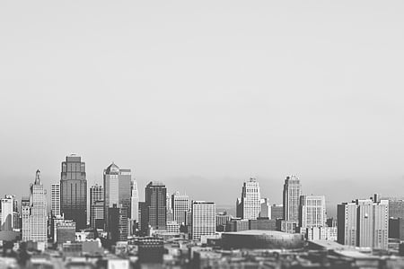 grayscale and landscape photography of high-rise buildings thumbnail