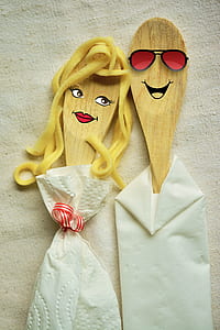two brown wooden ladle artworks thumbnail