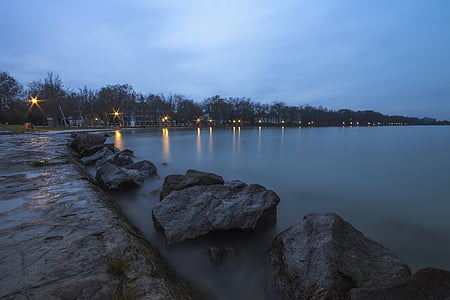 coastline facing calm body of water thumbnail
