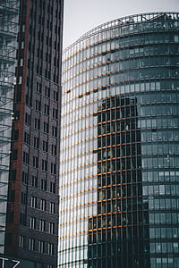 building reflecting beside mirror building thumbnail