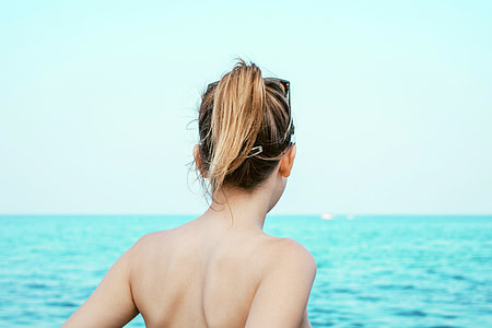 Back of a girl at the beach thumbnail
