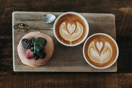 espresso on ceramic mugs above wooden tray thumbnail