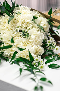 Beautiful bouquet of white flowers on a table thumbnail